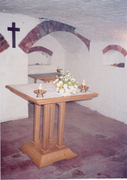 The altar in the Martyrs' Chapel, in the cellar of a house opposite the Priory Gatehouse at Walsingham, where Nicholas Mileham, the last sub-prior, and the layman Thomas Guisborough, were held on the night before his martyrdom